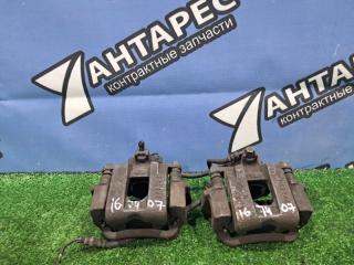 Суппорт Mitsubishi Canter FE70B 4D33 2002 передний левый (б/у)
