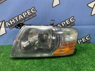 Фара Mitsubishi Pajero V75W 6G74 1999 левая (б/у)